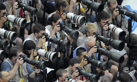 Photographers at work during the 2008 Beijing Games