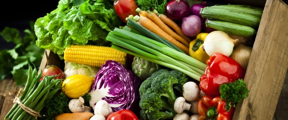 Wooden crate filled with fresh organic vegetables