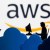 تظهر السحابة وأشكال ثلاثية الأبعاد المطبوعة أمام شعار الخدمة السحابية من أمازون AWS (Amazon Web Service) في رسم توضيحي تم التقاطه في 8 فبراير 2022
